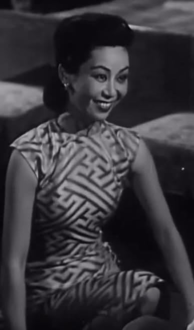 60年代 - 蓝韵流光：一件六十年代港工旗袍的时空叙事 | 1960s - Azure Rhythm in Flow: The Spatiotemporal Narrative of a 1960s Hong Kong-Made Qipao