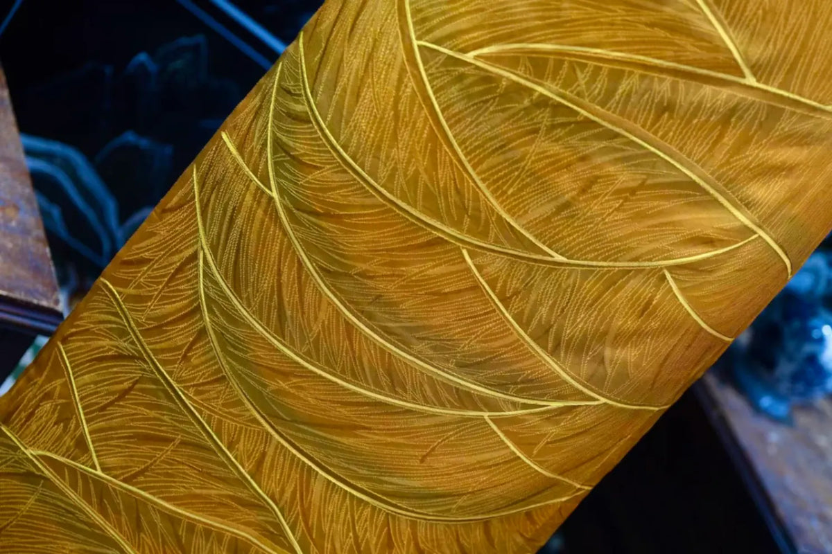 金羽织锦 · 浮雕羽叶真丝面料 | Golden Plumage - Embossed Leaf Silk Fabric